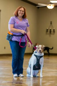 Kim Jukes and Heather teaching a group basic manners class