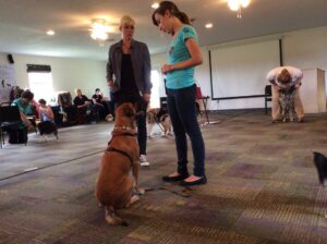 Emily Larlham instructs attendees in the training room