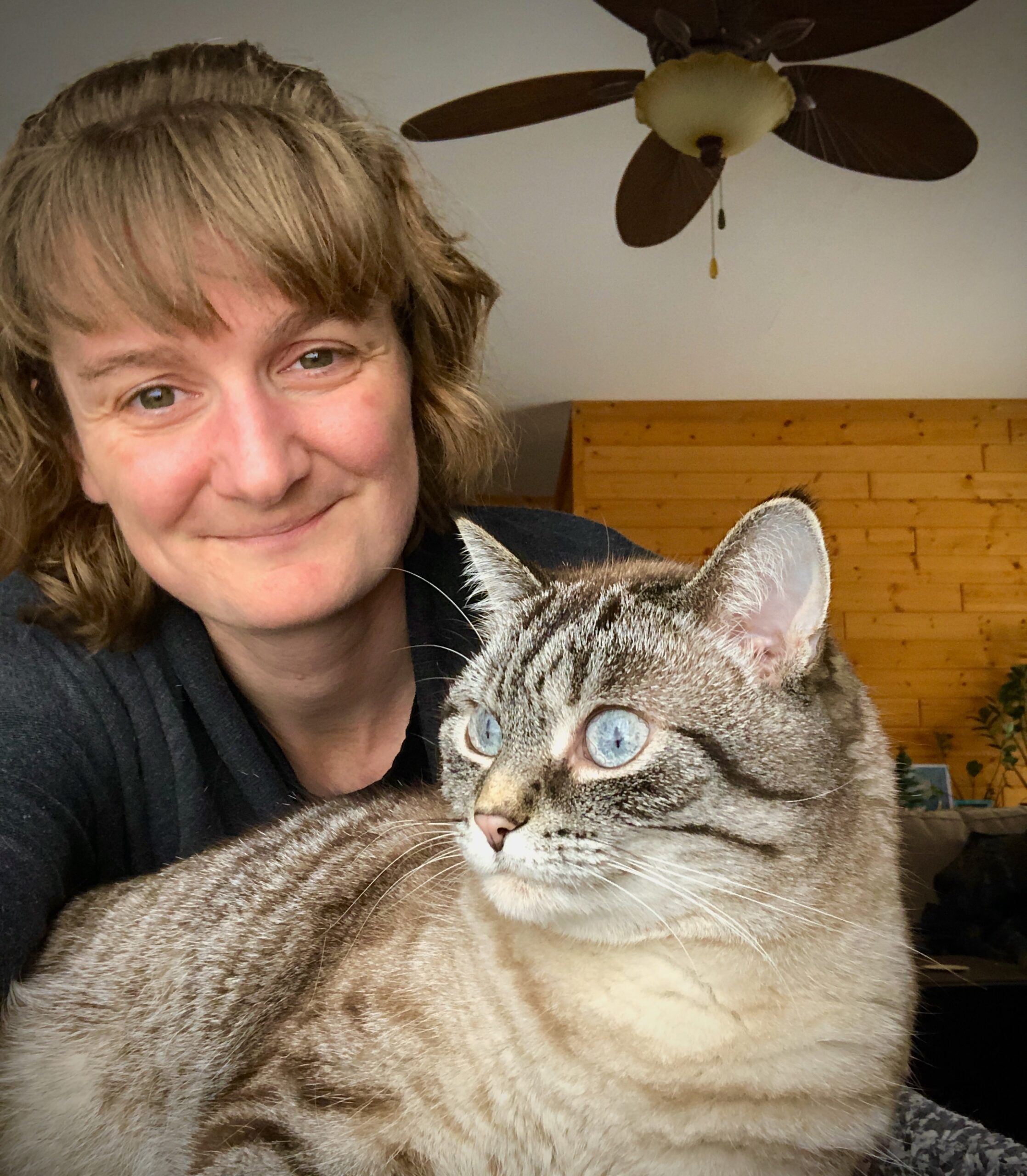 Photograph of the author, Haley, and her cat Calypso.