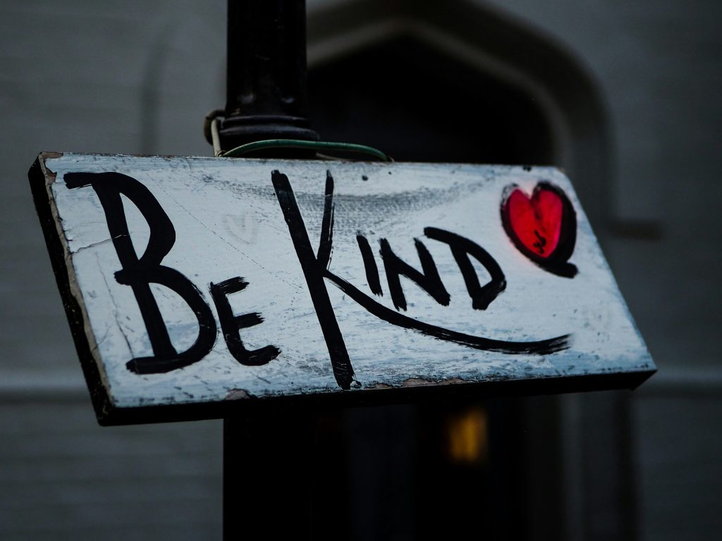Sign says, "Be Kind"